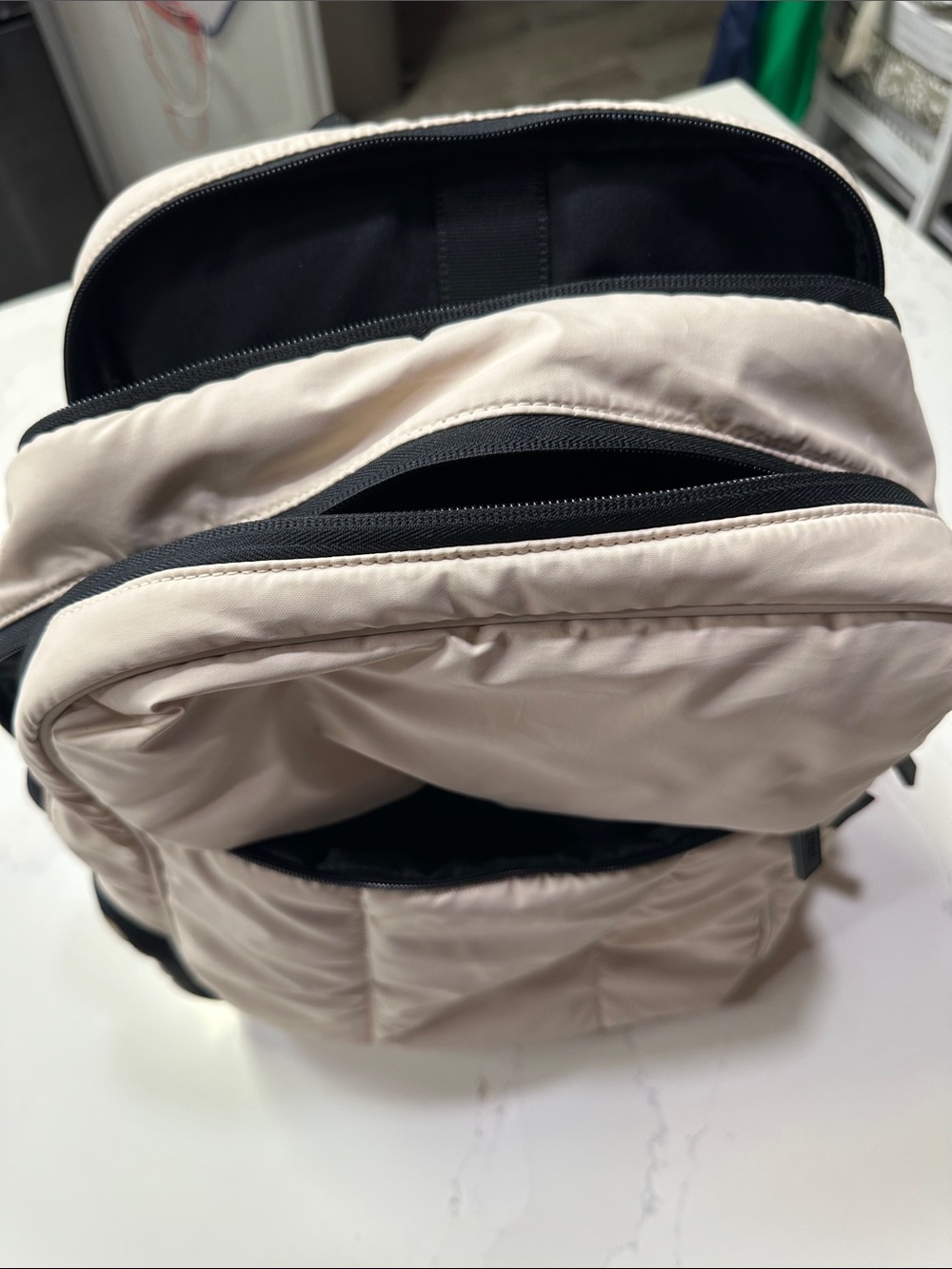 Calpak Light Beige Padded Backpack with Black Accents. Travel Backpack - Picture 9 of 11